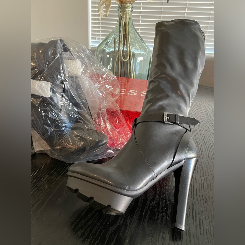 Brand new Guess- black, high boot size 6.5. Super cute & sexy.